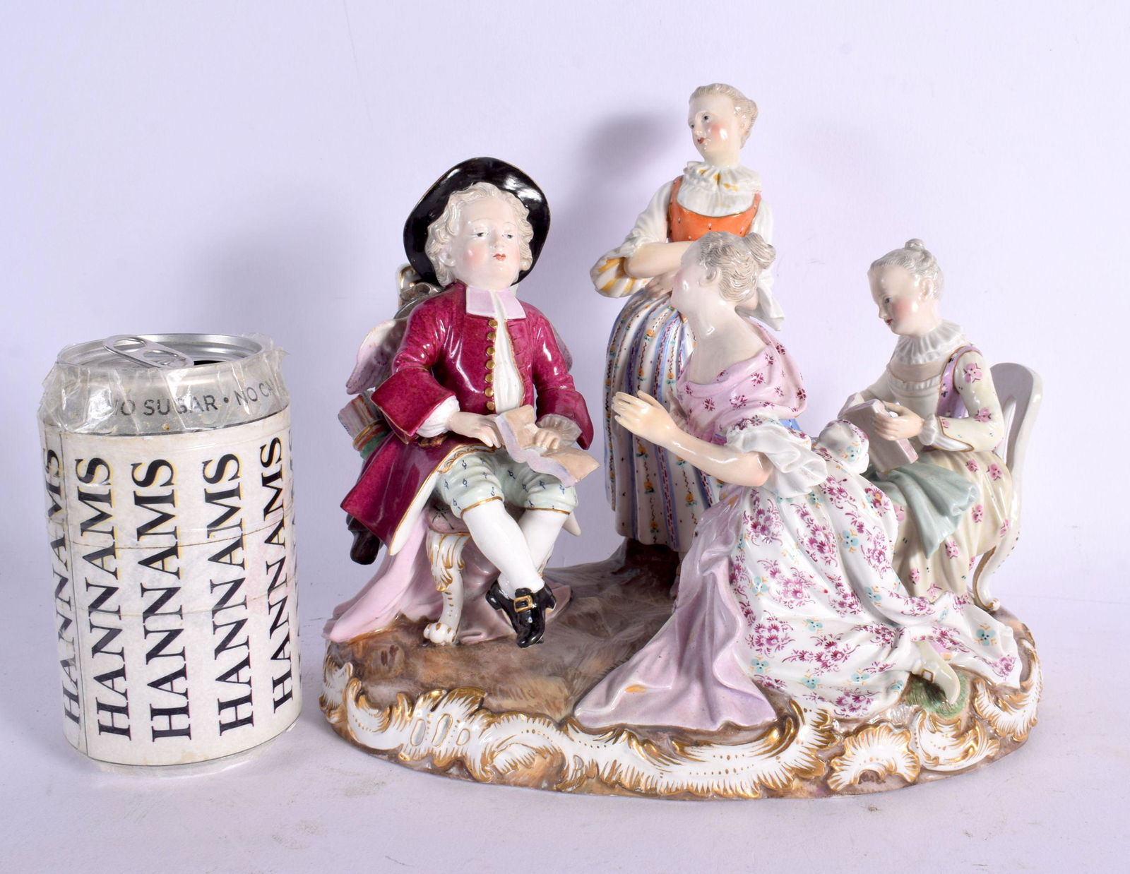 A LARGE 19TH CENTURY MEISSEN PORCELAIN FIGURAL GROUP modelled as a young boy before three females. 2 (1 of 5)