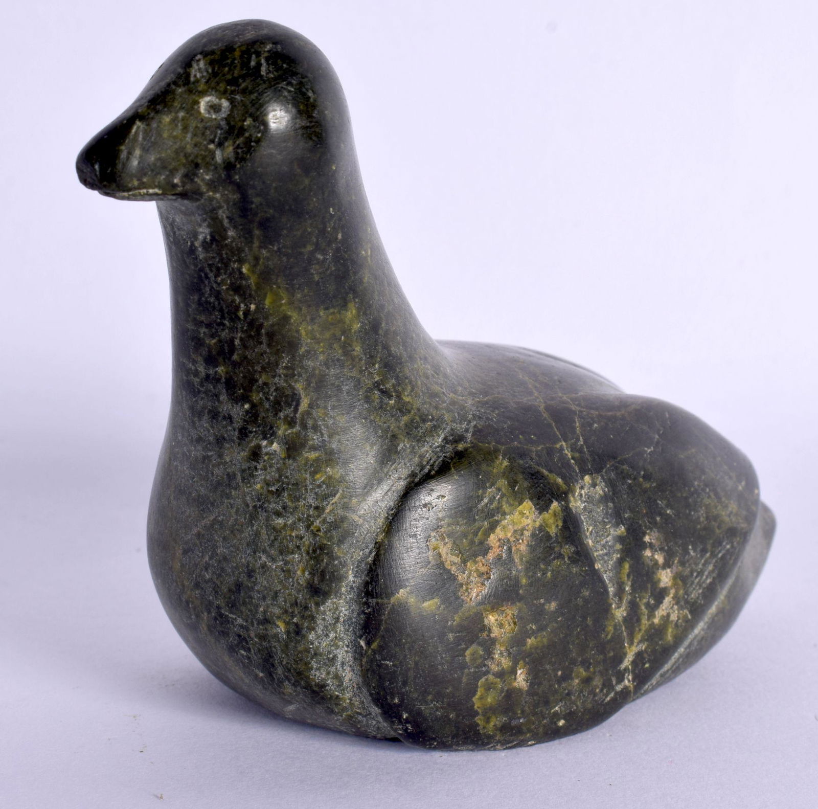 A NORTH AMERICAN INUIT CARVED STONE FIGURE OF A BIRD. 12 cm x 8 cm. (1 of 4)