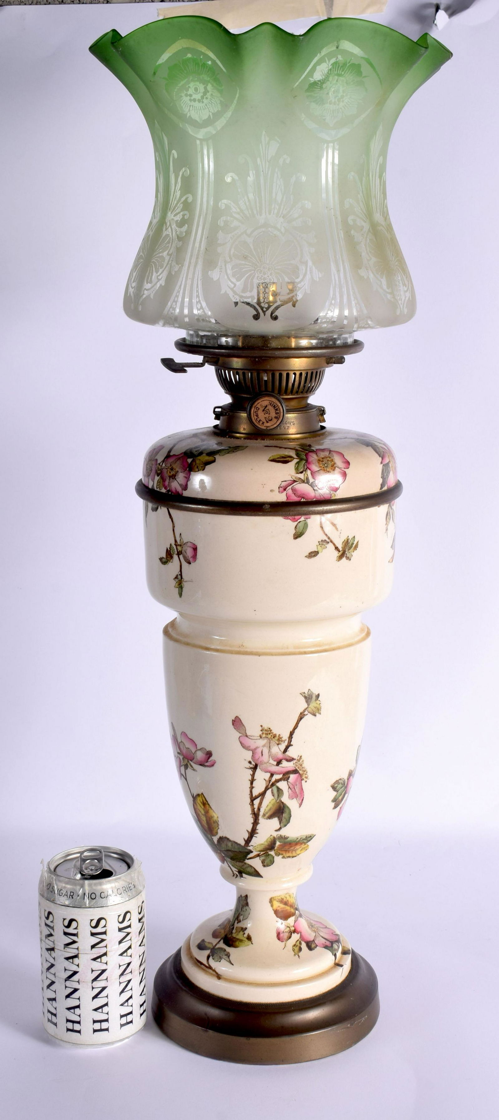 A LARGE ANTIQUE ENGLISH COUNTRY HOUSE POTTERY OIL LAMP decorated with foliage. 58 cm high. (1 of 6)