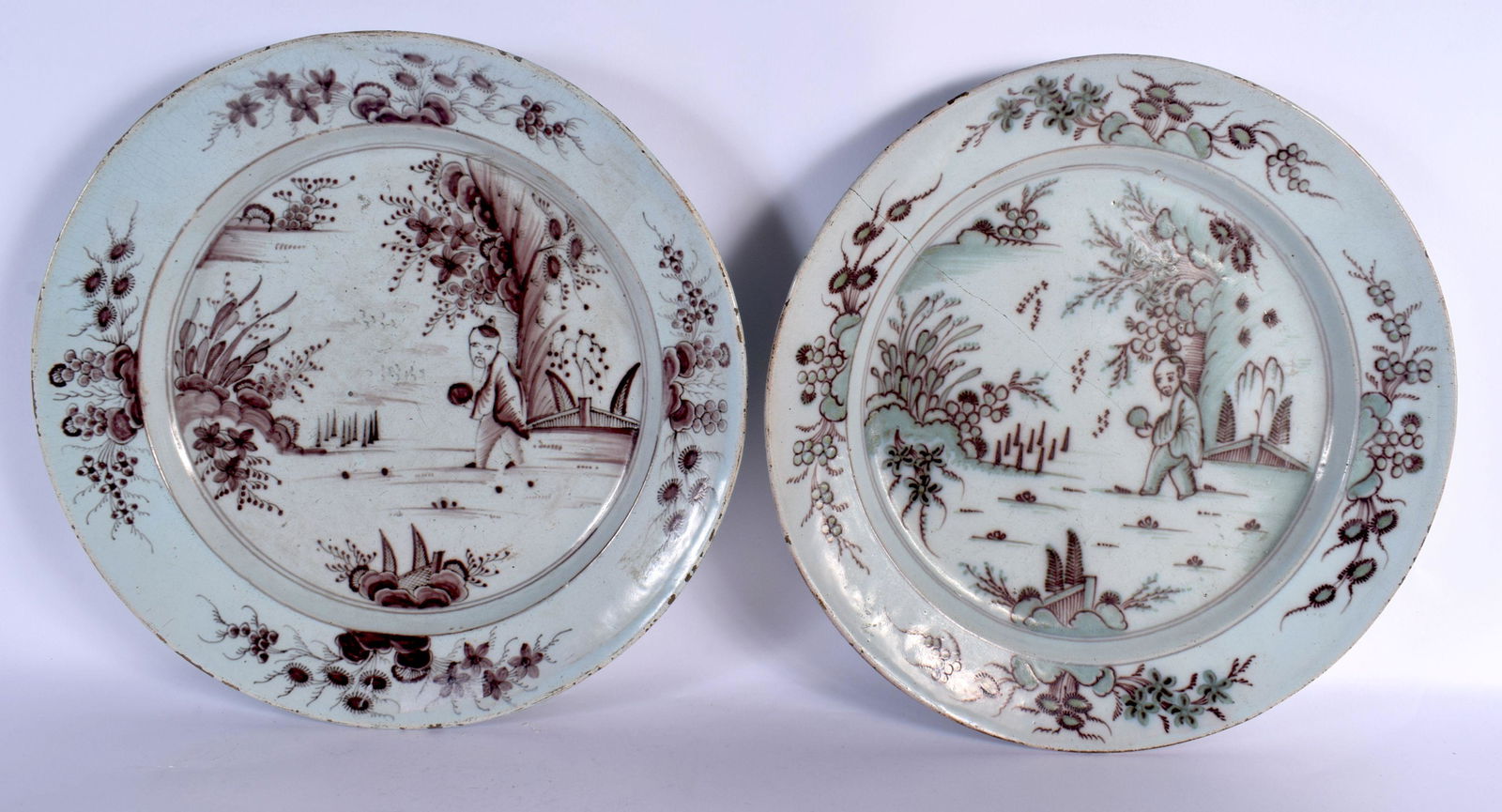 A RARE LARGE PAIR OF EARLY 18TH CENTURY DELFT MANGANESE TIN GLAZED CHARGERS painted with Oriental fi (1 of 11)