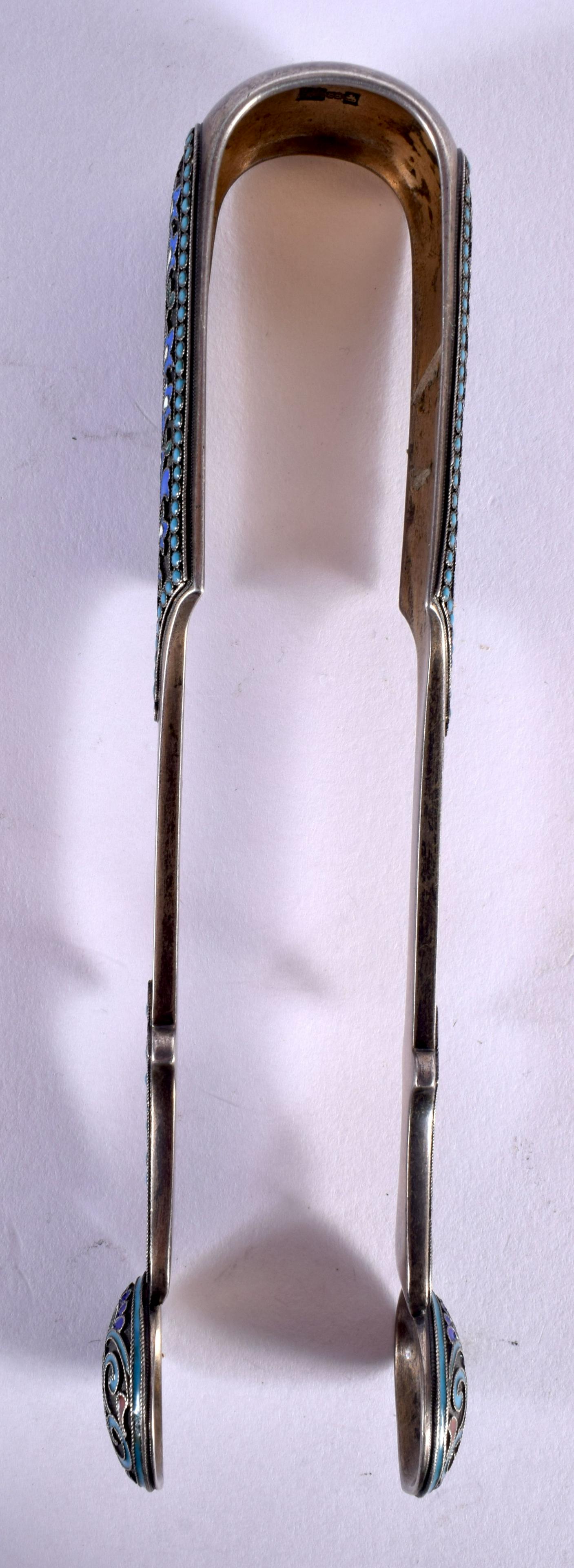 A PAIR OF ANTIQUE RUSSIAN SILVER AND ENAMEL SUGAR TONGS. 63 grams. 14 cm long. (1 of 4)