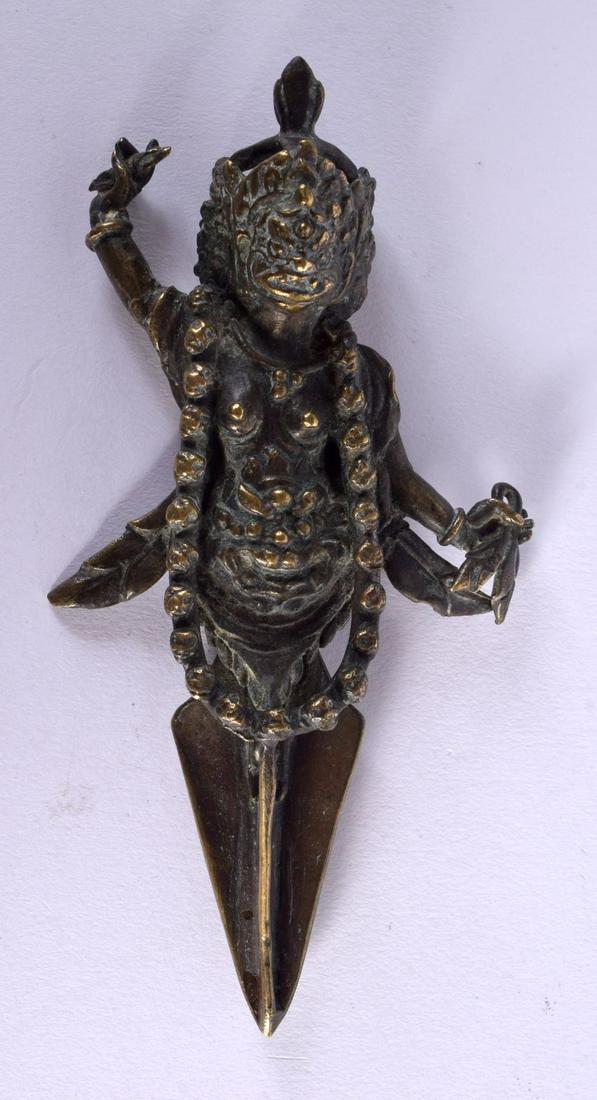 AN 18TH/19TH CENTURY CHINESE TIBETAN BRONZE BUDDHISTIC PHURBA decorated with mask heads. 15 cm x 7 c (1 of 2)