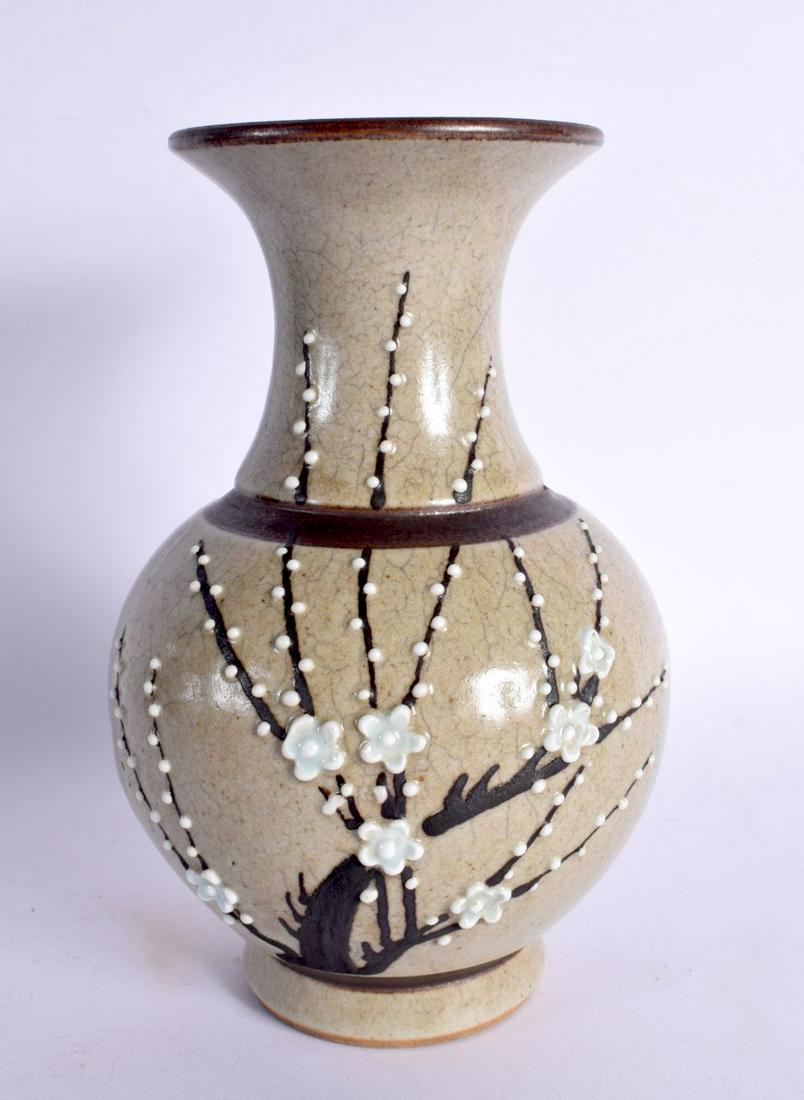 A 19TH CENTURY CHINESE CRACKLE GLAZED STONEWARE VASE Qing, enamelled in relief with foliage. 22.5 cm (1 of 4)