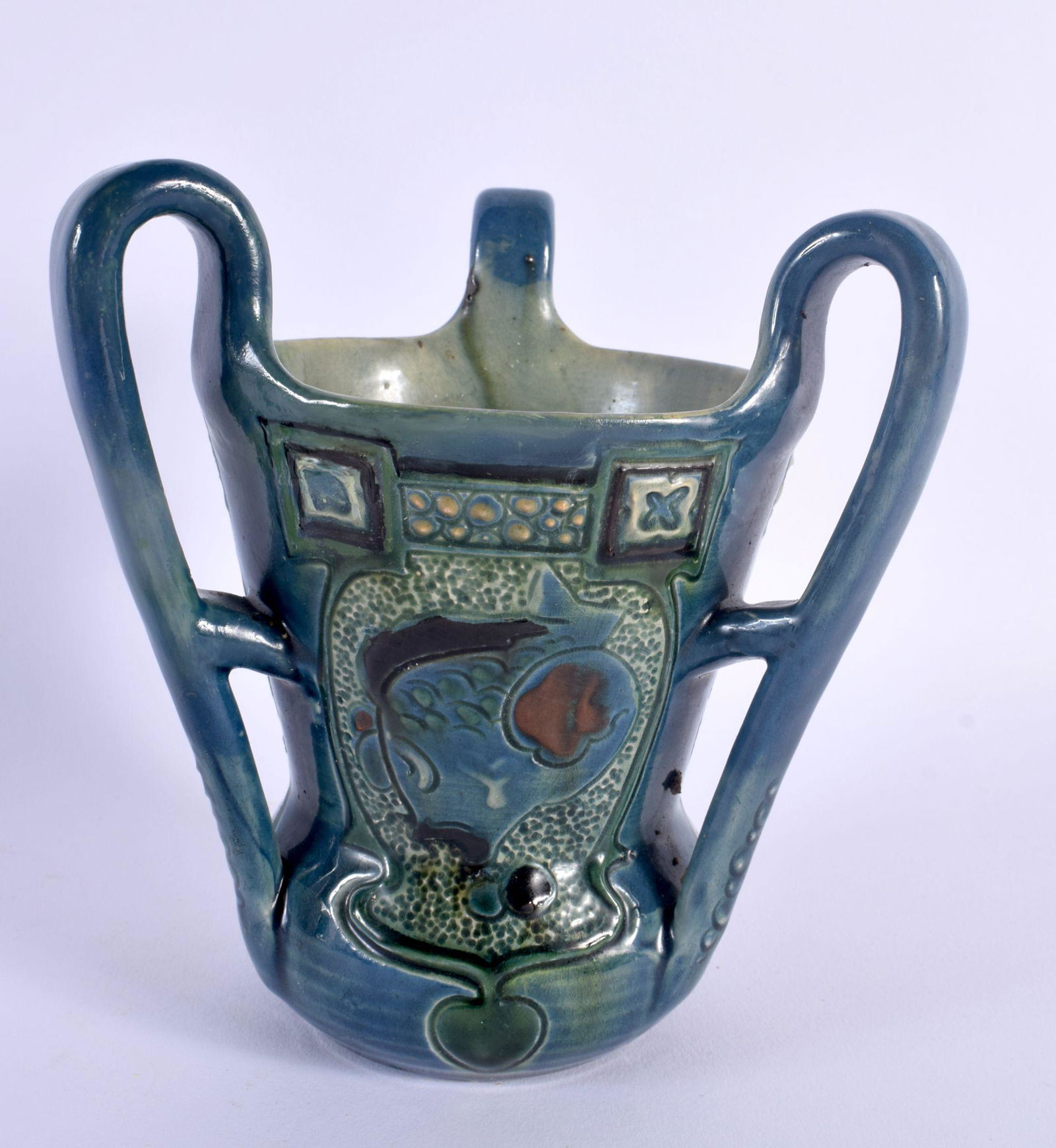 AN ART NOUVEAU BRANNAM THREE HANDLED POTTERY TYG C1900, decorated with fish. 15 cm x 14 cm. (1 of 5)