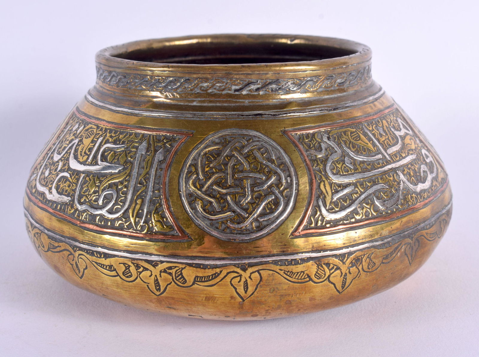 A 19TH CENTURY MIDDLE EASTERN ISLAMIC SILVER INLAID CENSER decorated with scripture and motifs. 14 c (1 of 4)