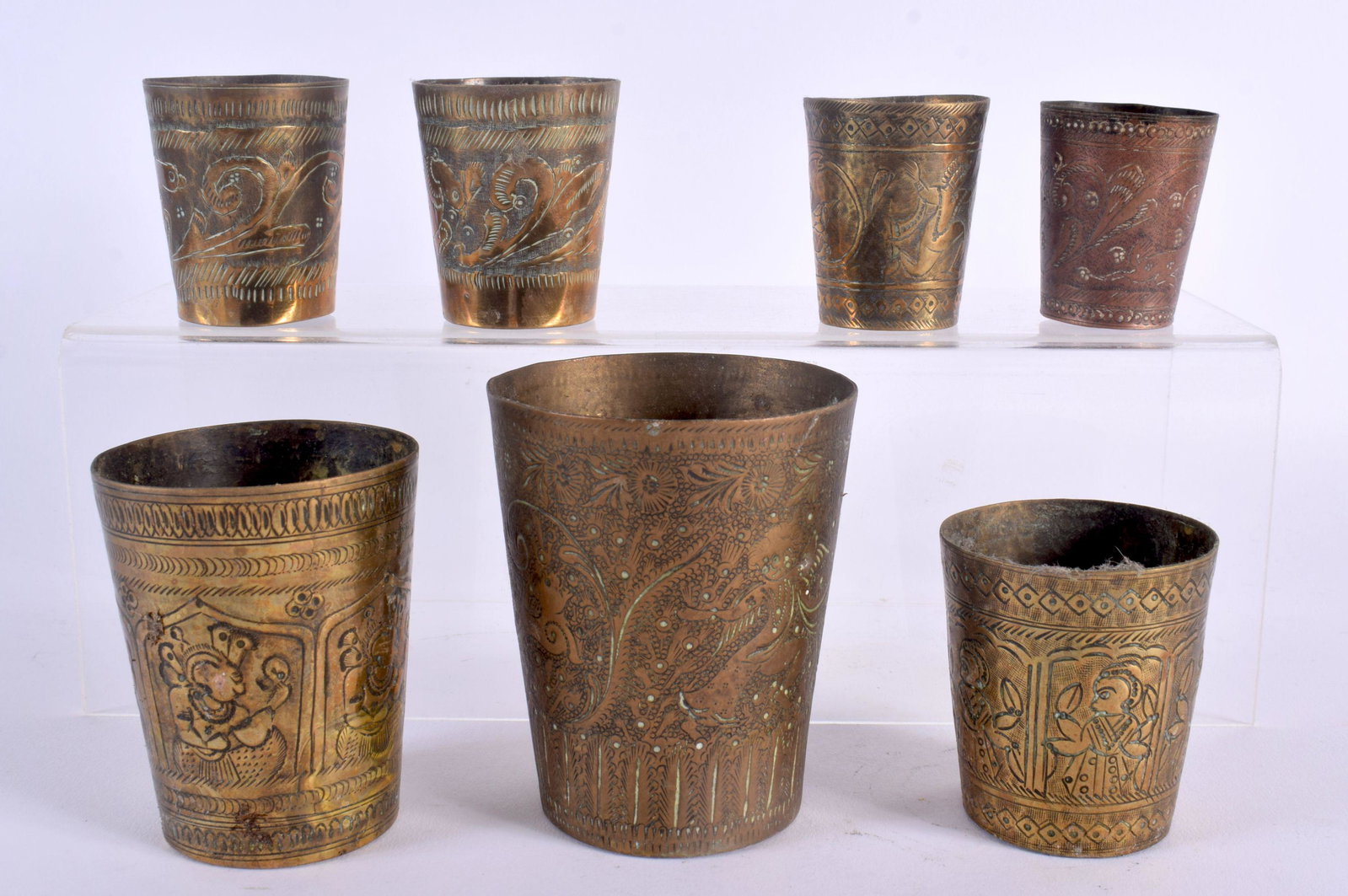 SEVEN 19TH CENTURY INDIAN BRONZE BEAKERS. Largest 9.5 cm high. (7): SEVEN 19TH CENTURY INDIAN BRONZE BEAKERS. Largest 9.5 cm high. (7)