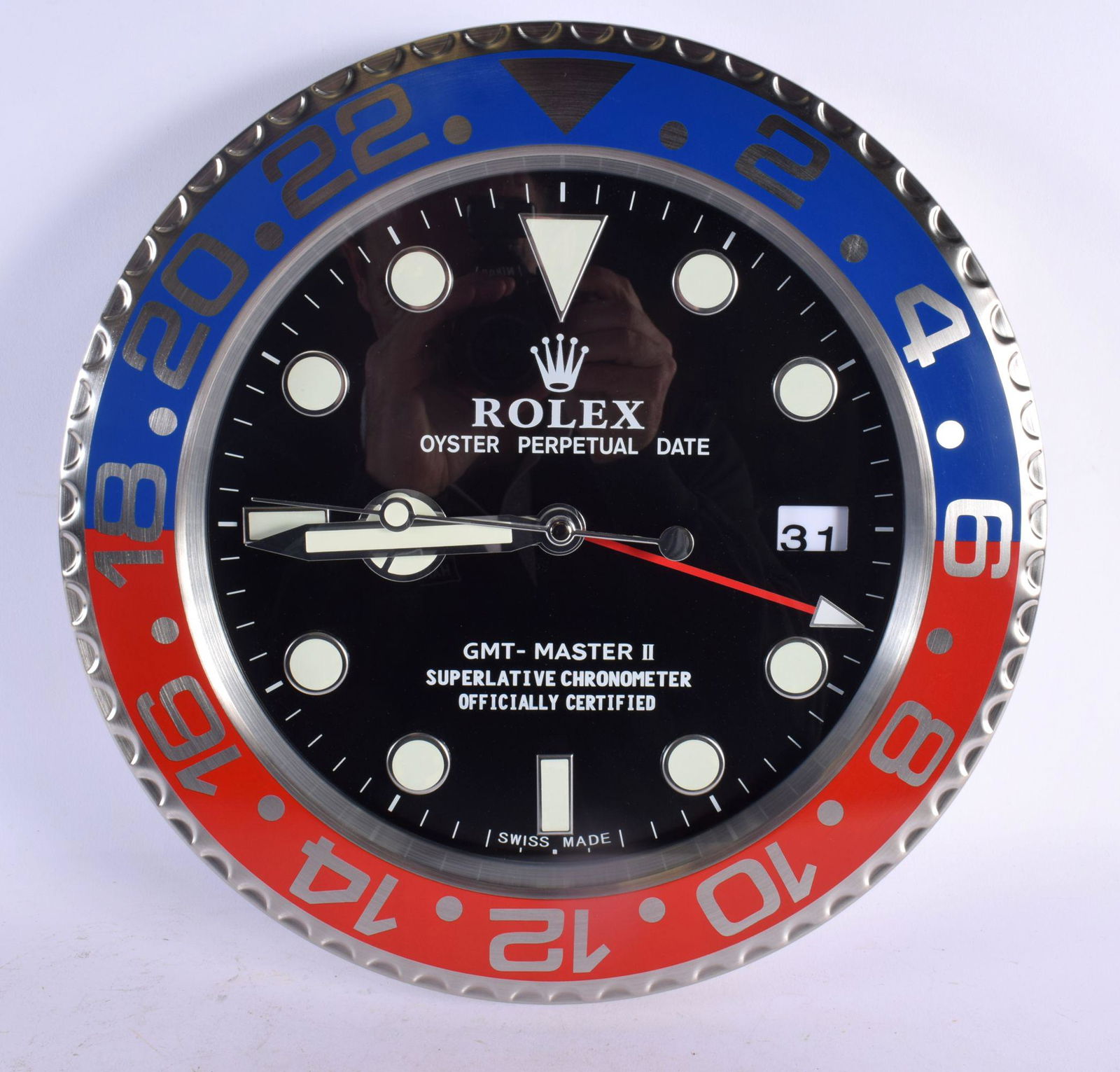 A ROLEX SHOP DISPLAY ADVERTISING WALL CLOCK. 33 cm diameter.: A ROLEX SHOP DISPLAY ADVERTISING WALL CLOCK. 33 cm diameter.