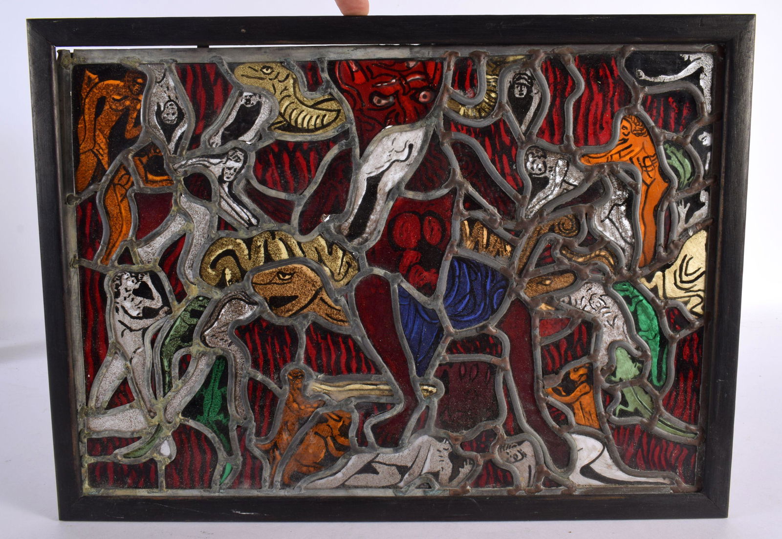 A RARE STAINED GLASS WINDOW in the manner of Marc Chagall, depicting demonic figures in various purs (1 of 5)
