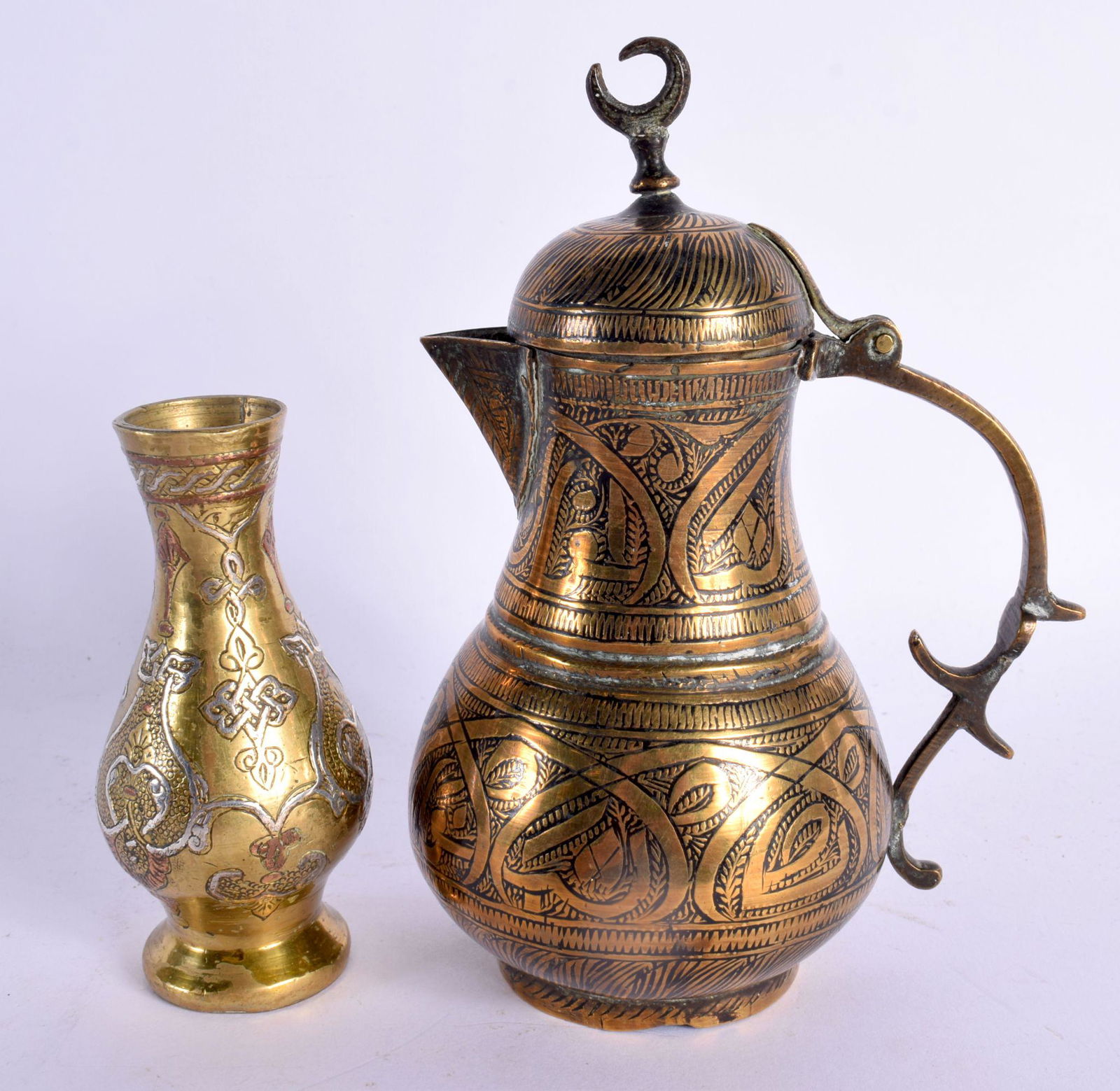 A 19TH CENTURY MIDDLE EASTERN SILVER INLAID BRONZE VASE together with an Ottoman type jug. Largest 1 (1 of 4)