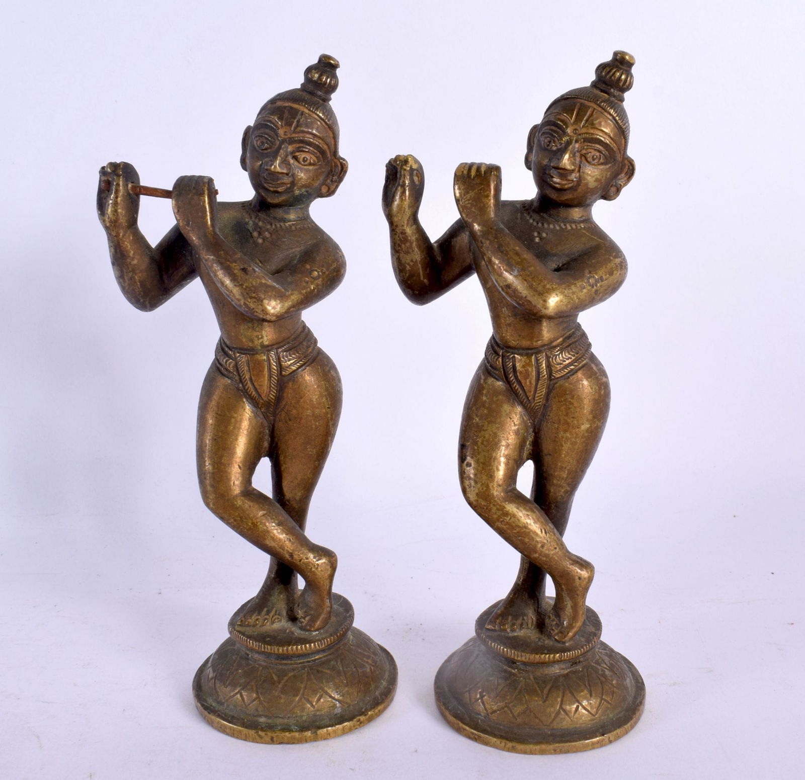 A PAIR OF 17TH/18TH CENTURY INDIAN BRONZE FIGURES OF BUDDHISTIC DEITIES modelled as musicians. Large (1 of 3)