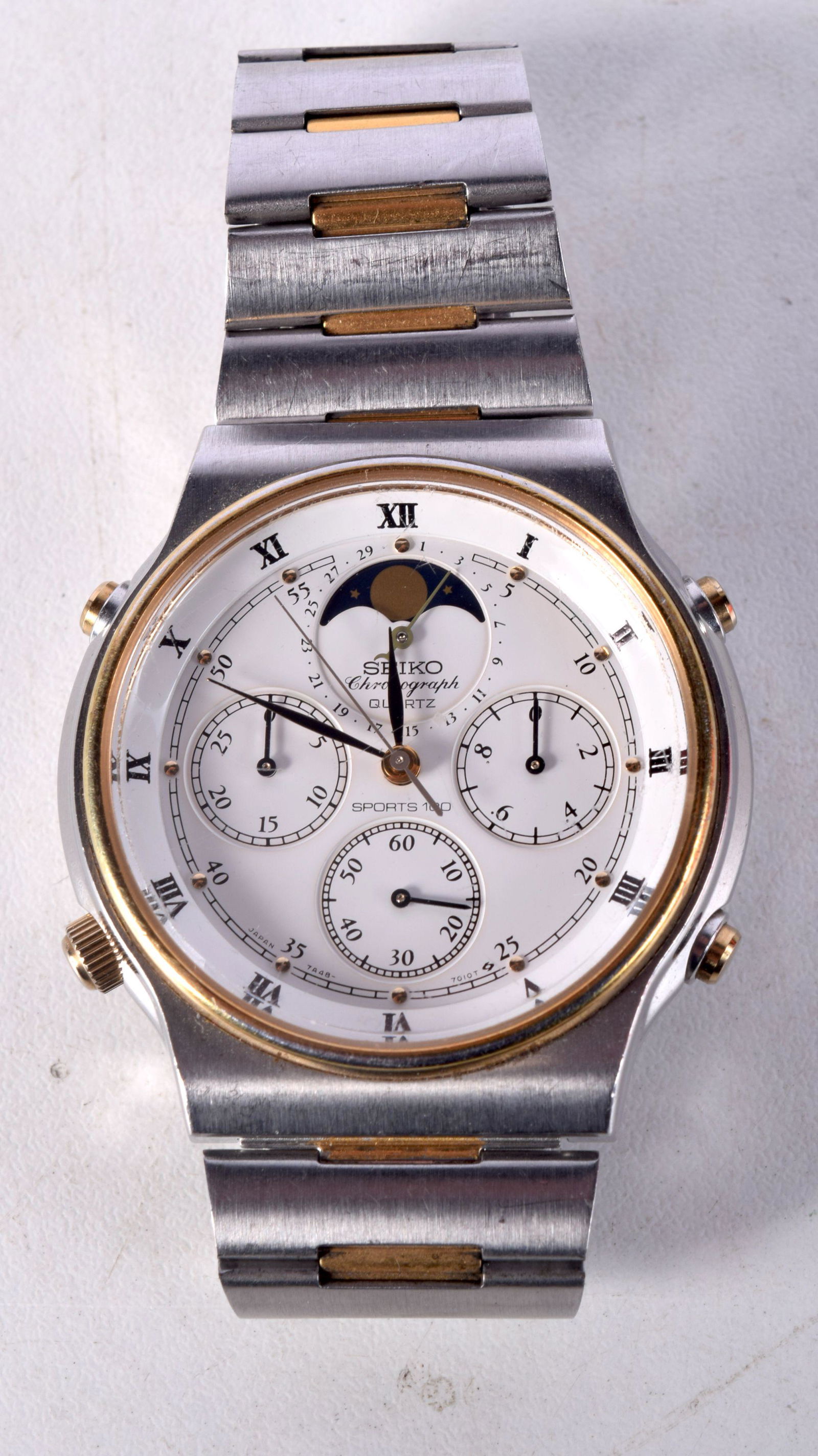 A SEIKO MOON PHASE CALENDER WATCH. 4 cm wide. (1 of 4)