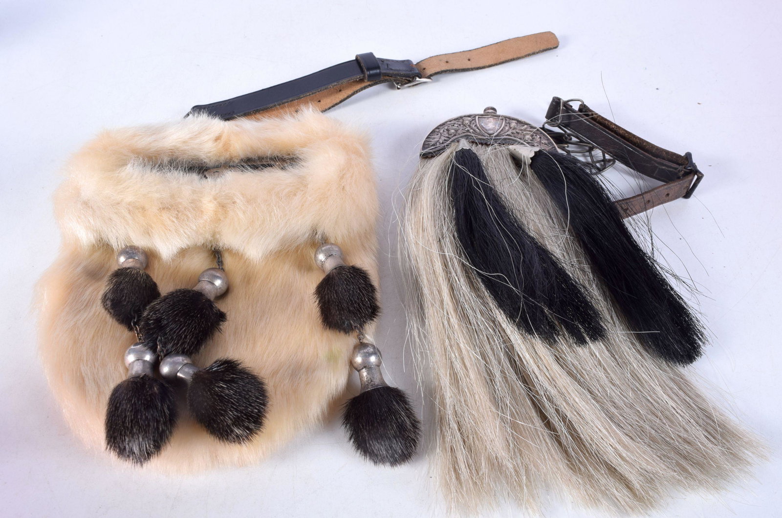 TWO VINTAGE SCOTTISH SPORRANS. Largest 21 cm x 15 cm. (2): TWO VINTAGE SCOTTISH SPORRANS. Largest 21 cm x 15 cm. (2)
