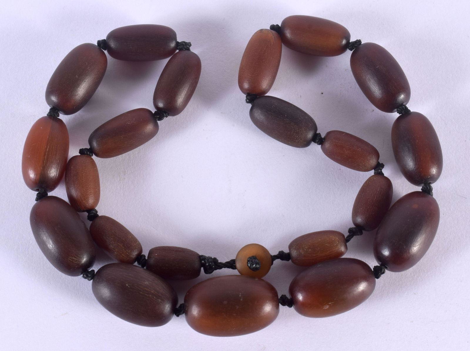 A 19TH CENTURY CHINESE CARVED RHINOCEROS HORN PRAYER BEAD NECKLACE Qing. 57.5 grams. 50 cm long, lar (1 of 2)