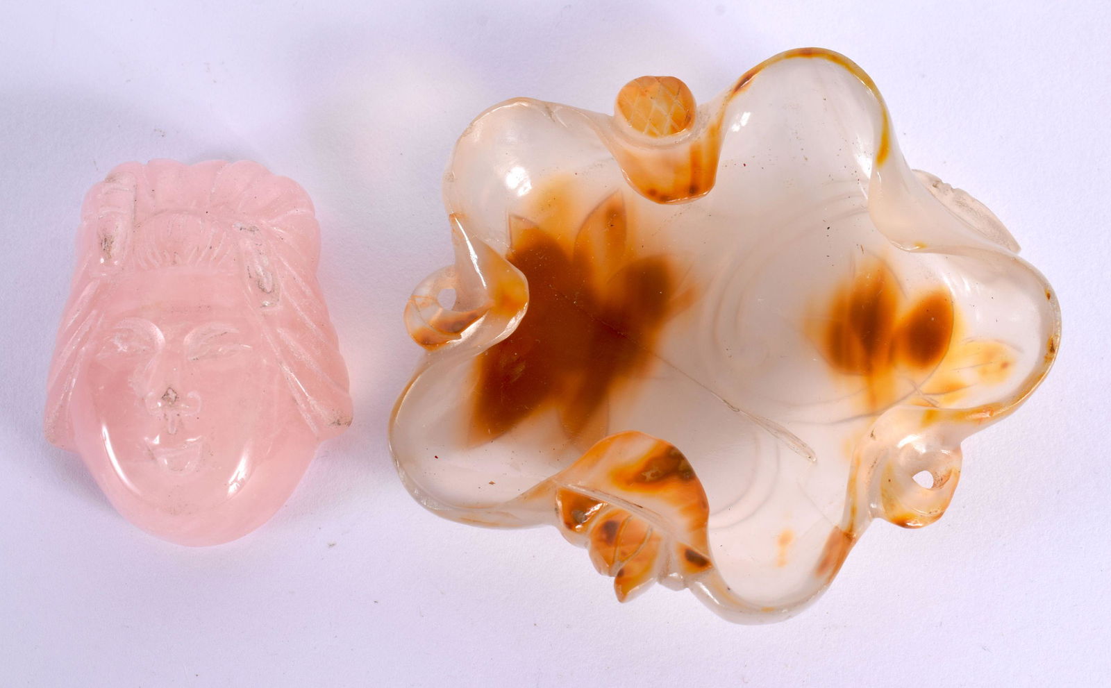 AN EARLY 20TH CENTURY CHINESE CARVED AGATE BRUSH WASHER together with a rose quartz head. Largest 7. (1 of 2)