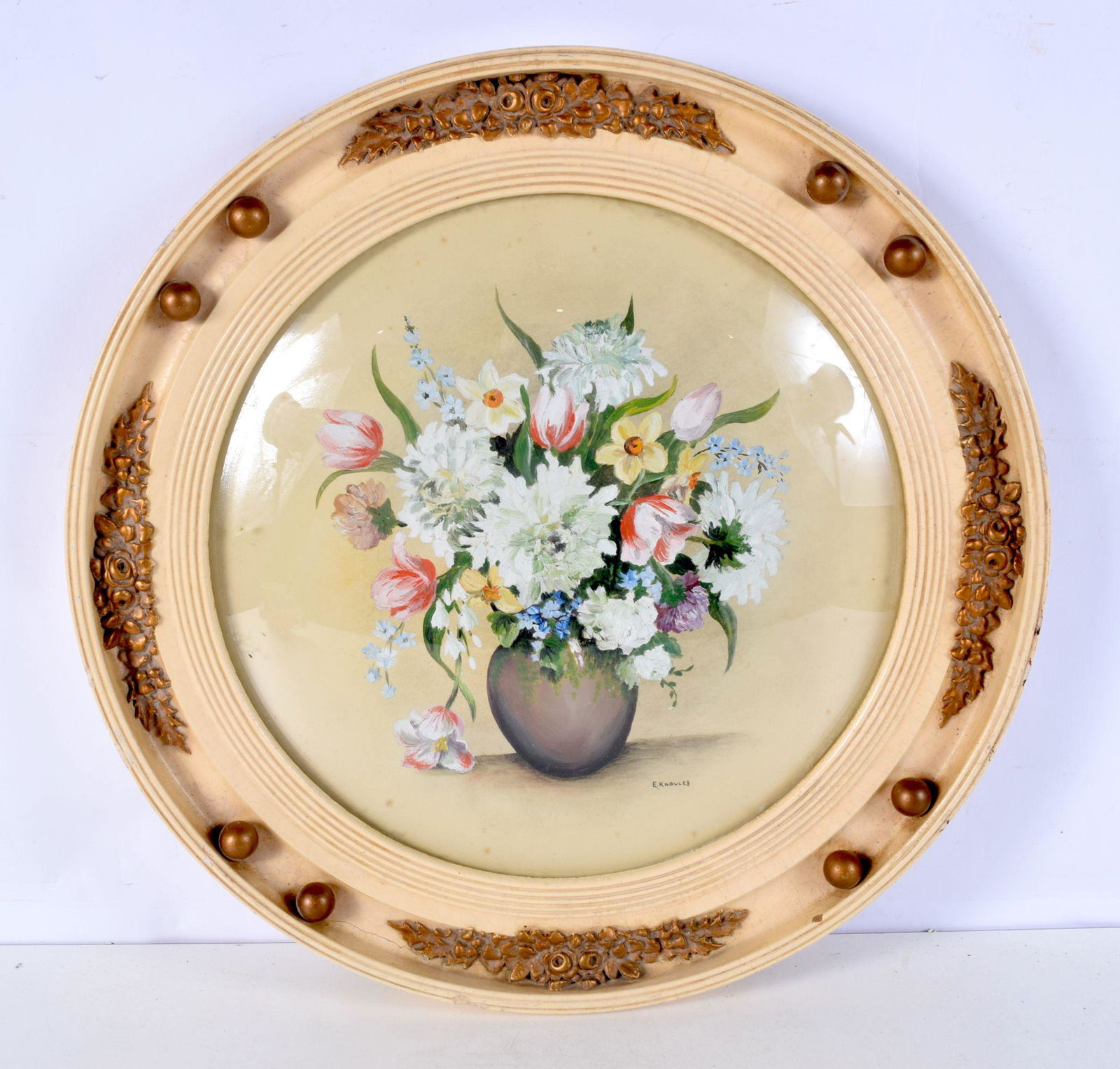 A framed oil on board by E Knowles of flowers in a vase 34cm diameter. (1 of 3)