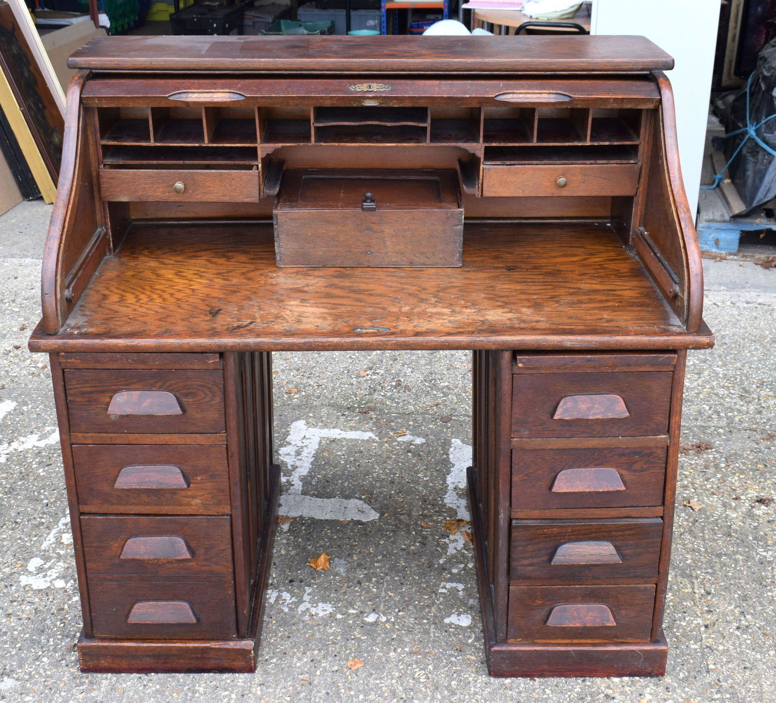 A VINTAGE ROLL TOP DESK with supporting drawers. 126 cm x 75 cm. (1 of 8)