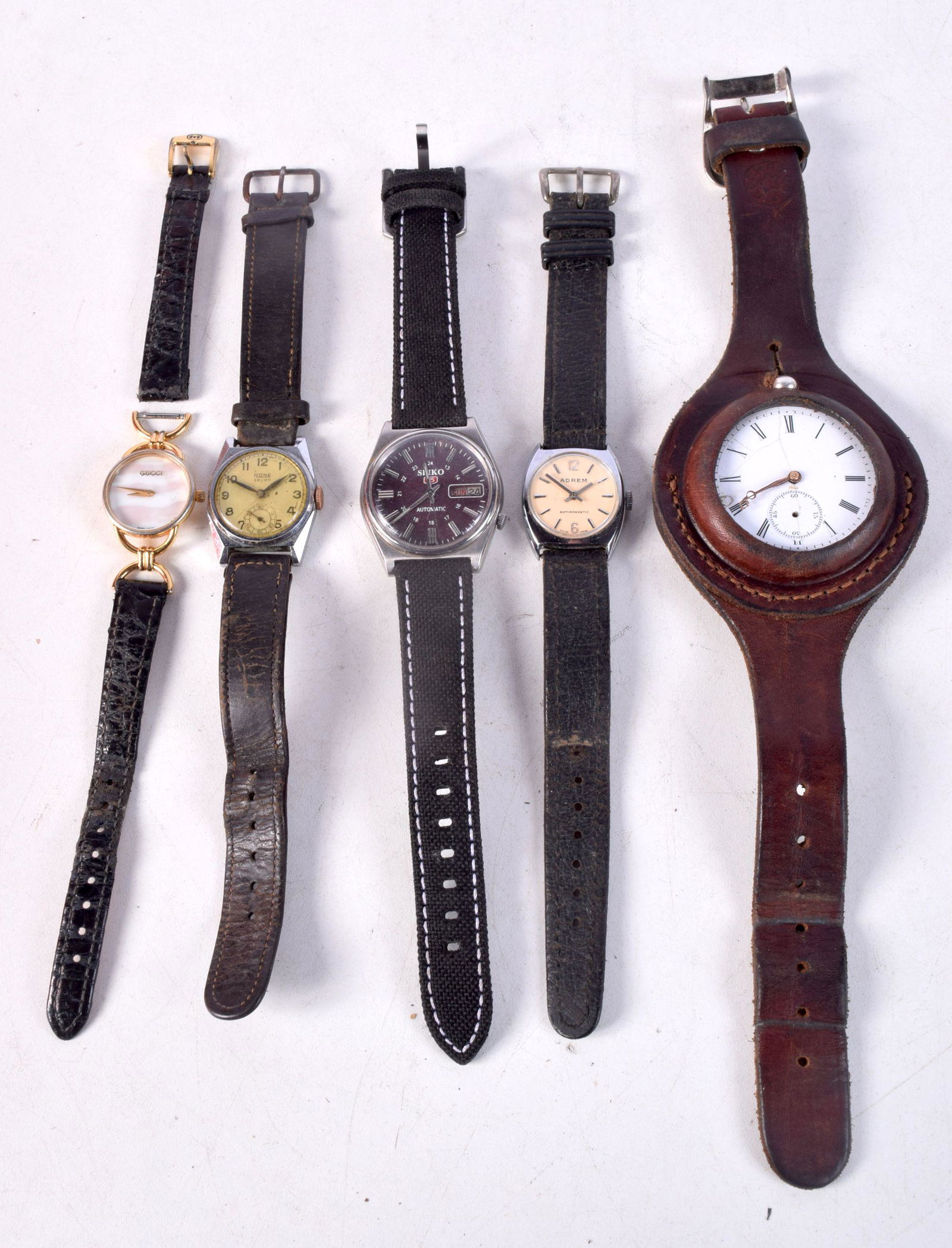 A Gucci Mother of Pearl faced wristwatch together with other watches Rone,Adrem Etc (5).: A Gucci Mother of Pearl faced wristwatch together with other watches Rone,Adrem Etc (5).