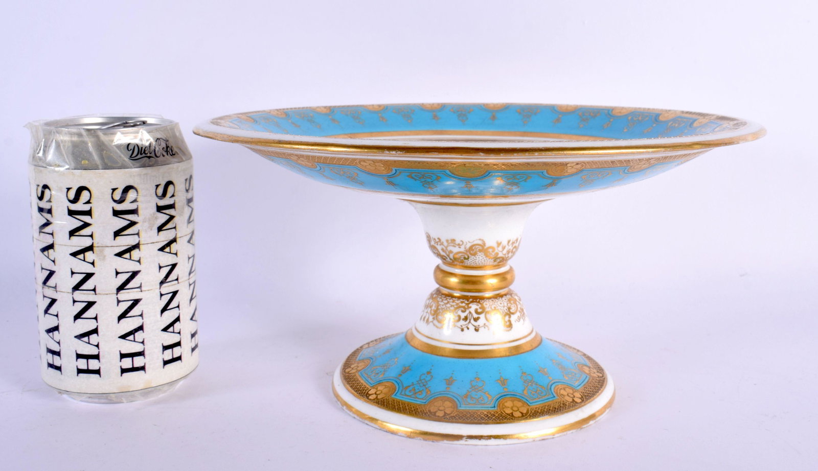 Minton fine comport painted with fruit under a turquoise and raised gilt border. 23.5cm diameter: Minton fine comport painted with fruit under a turquoise and raised gilt border. 23.5cm diameter