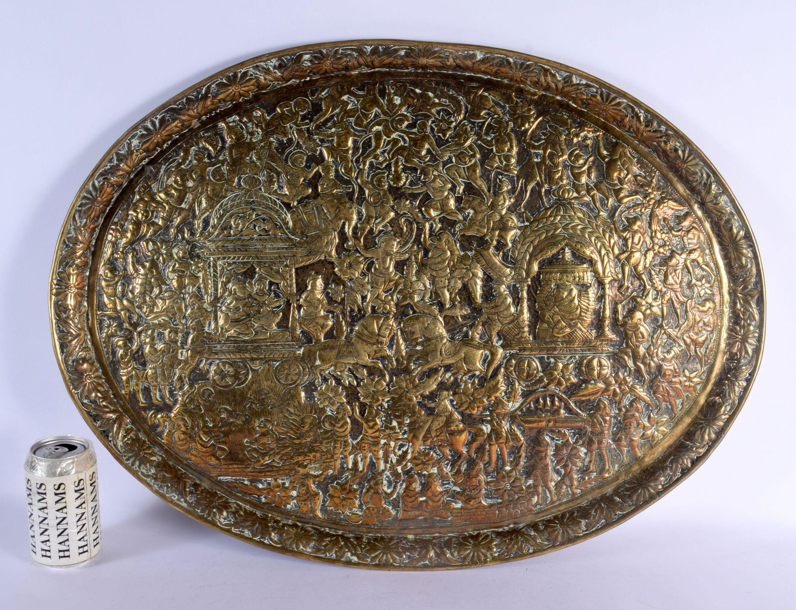 A LARGE 19TH CENTURY MIDDLE EASTERN INDIAN EMBOSSED METAL DISH decorated with figures in various pur (1 of 8)