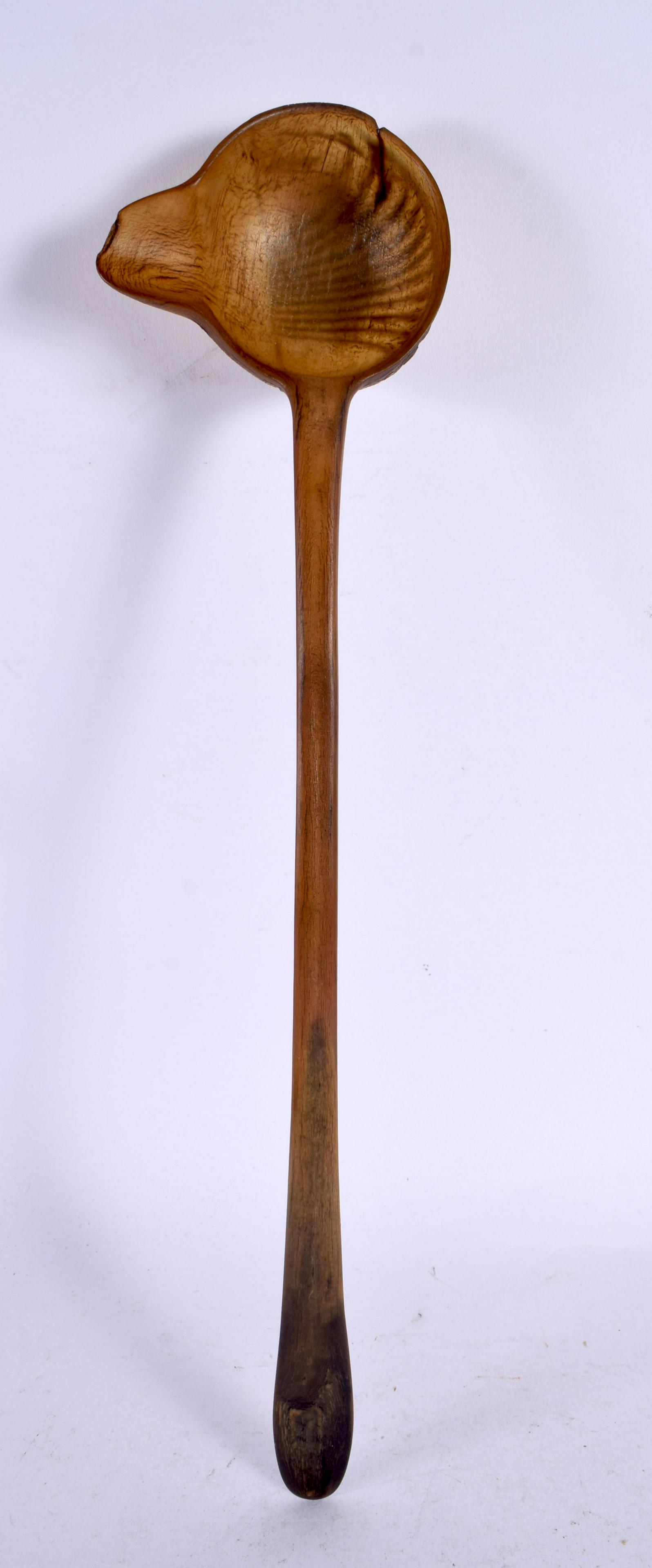 A 19TH CENTURY MIDDLE EASTERN CARVED RHINOCEROS HORN LADLE. 40 cm high. (1 of 6)