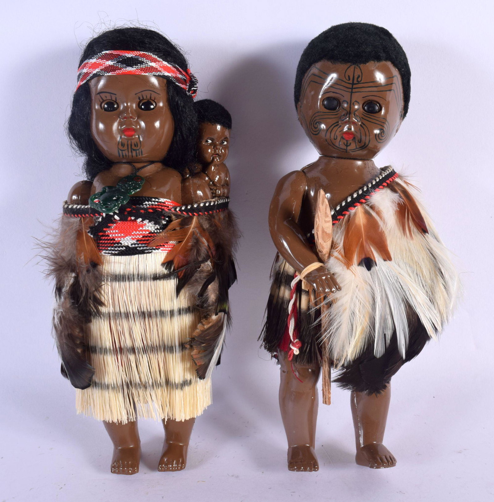 A PAIR OF UNUSUAL NEW ZEALAND MAORI DOLLS. 16 cm high.: A PAIR OF UNUSUAL NEW ZEALAND MAORI DOLLS. 16 cm high.