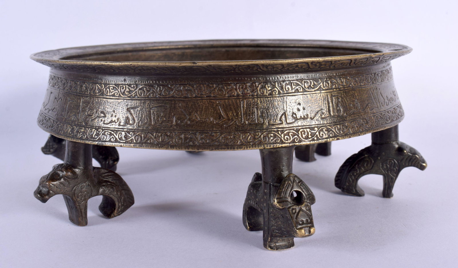 A 12TH / 13TH CENTURY PERSIAN INSCRIBED SIX FOOT BRONZE CENSER  the body incised with a multitude of (1 of 5)