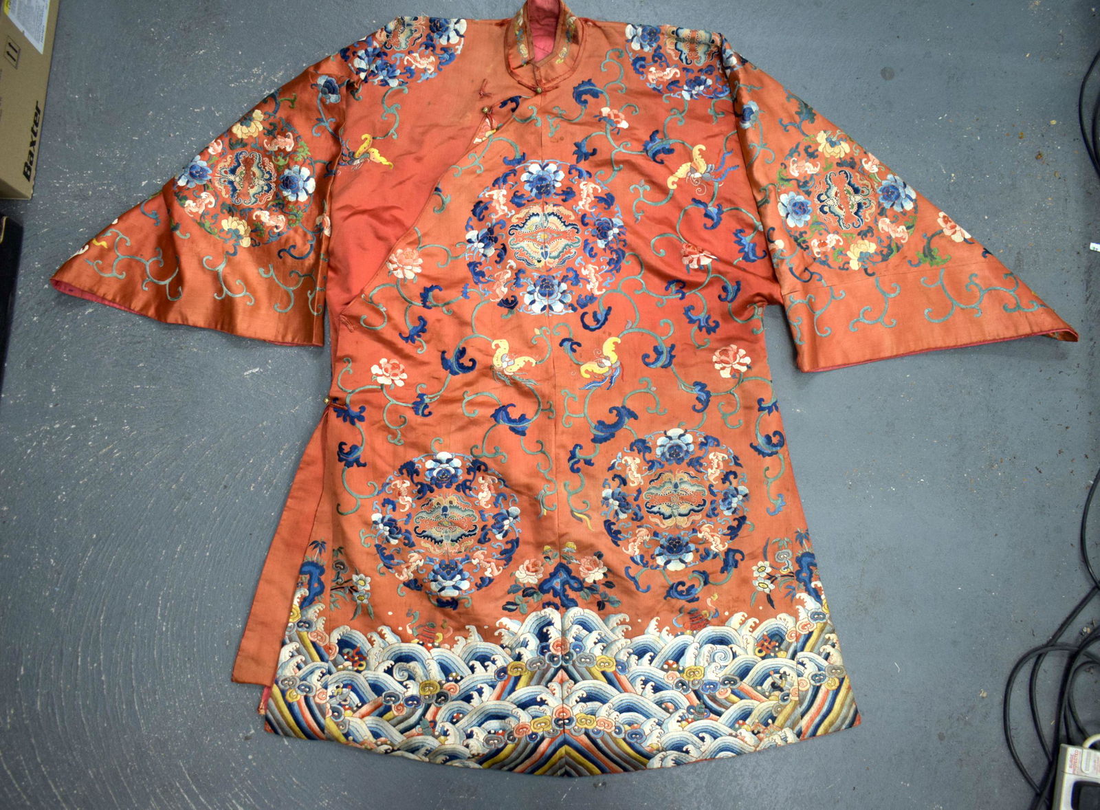A LARGE 19TH CENTURY CHINESE ORANGE CORAL RED SILK WORK ROBE decorated with floral roundels and trai (1 of 20)