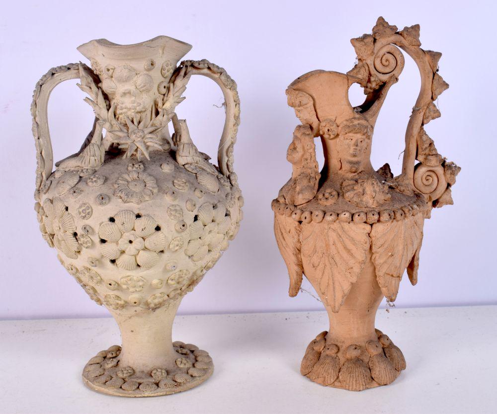 AN UNUSUAL EARLY 20TH CENTURY CONTINENTAL TWIN HANDLED VASE together with a similar ewer. Largest 18 (1 of 5)