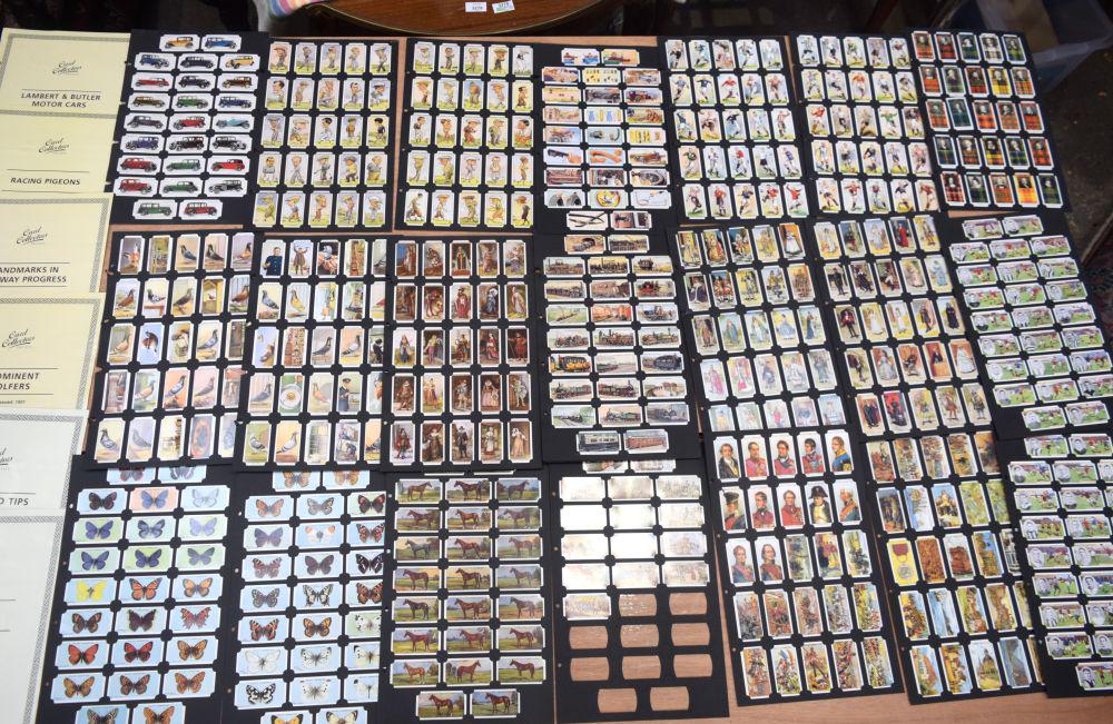 A card collectors Society folio of 24 Cigarette cards sets in an album . (1 of 4)