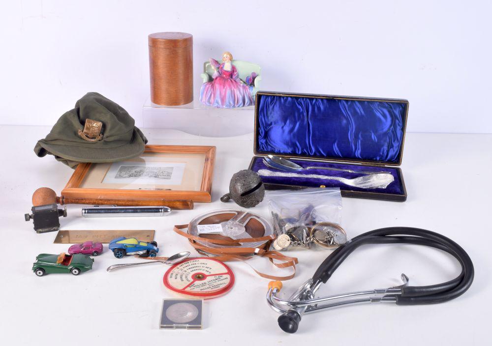 A miscellaneous collection Tibetan bronze bell, Royal Doulton figure, treen, silver tea spoon etc (Q (1 of 10)