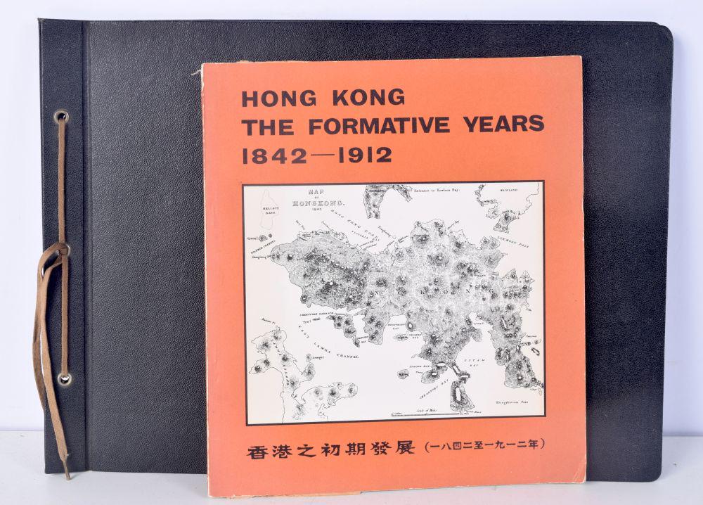 A folio of photographs of Hong Kong from the late 19th Century together with a book entitled Hong Ko: A folio of photographs of Hong Kong from the late 19th Century together with a book entitled Hong Kong The formative years 1842-1912. (2)