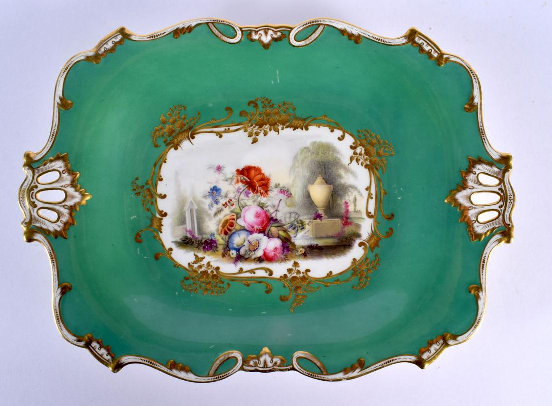 A FINE EARLY 19TH CENTURY ENGLISH TWIN HANDLED PORCELAIN DISH painted with an urn within a landscape (1 of 2)
