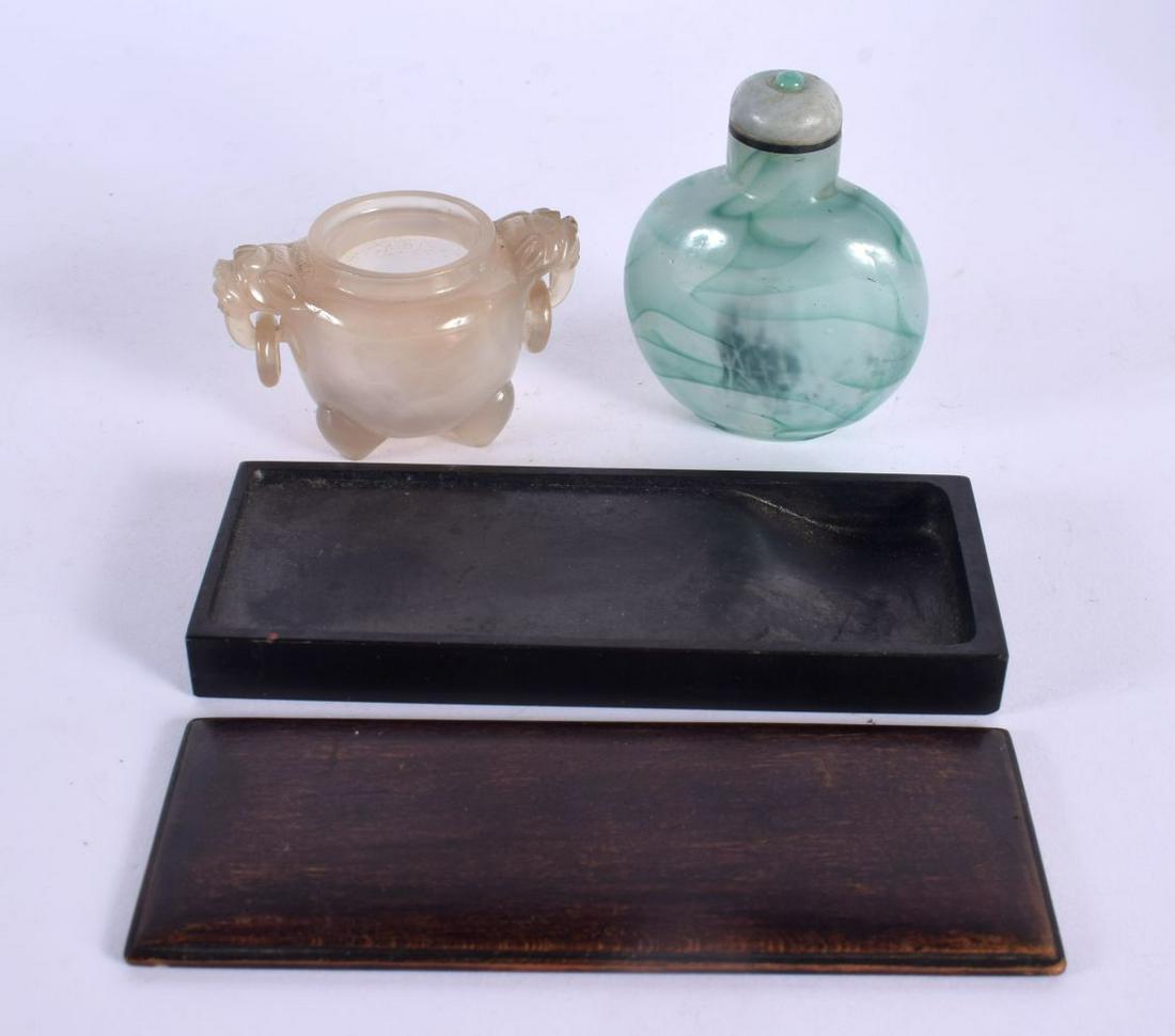 A 19TH CENTURY JAPANESE MEIJI PERIOD CARVED HARDWOOD INK BLOCK together with an agate koro & imitati: A 19TH CENTURY JAPANESE MEIJI PERIOD CARVED HARDWOOD INK BLOCK together with an agate koro & imitation glass snuff bottle. Largest 12 cm high. (3)