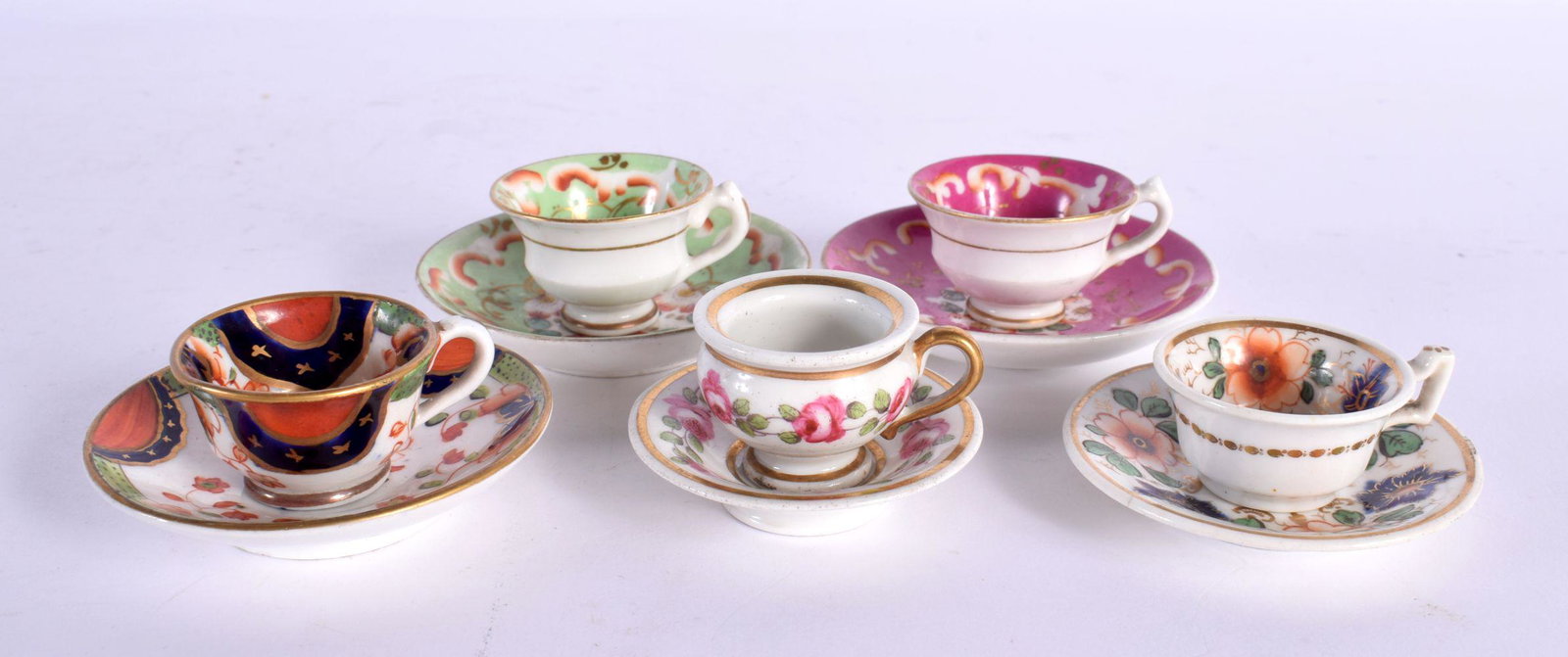 19TH CENTURY COLLECTION OF FIVE MINIATURE PORCELAIN CUPS AND SAUCERS WITH IMARI OR FLORAL DESIGNS (1 of 3)