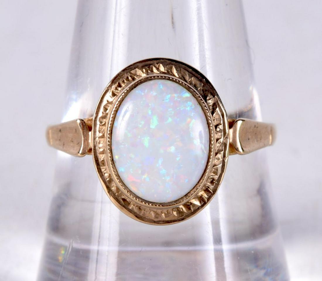 A 9CT GOLD AND OPAL RING.  Hallmarked Birmingham 375, Size Q, weight 3g (1 of 3)