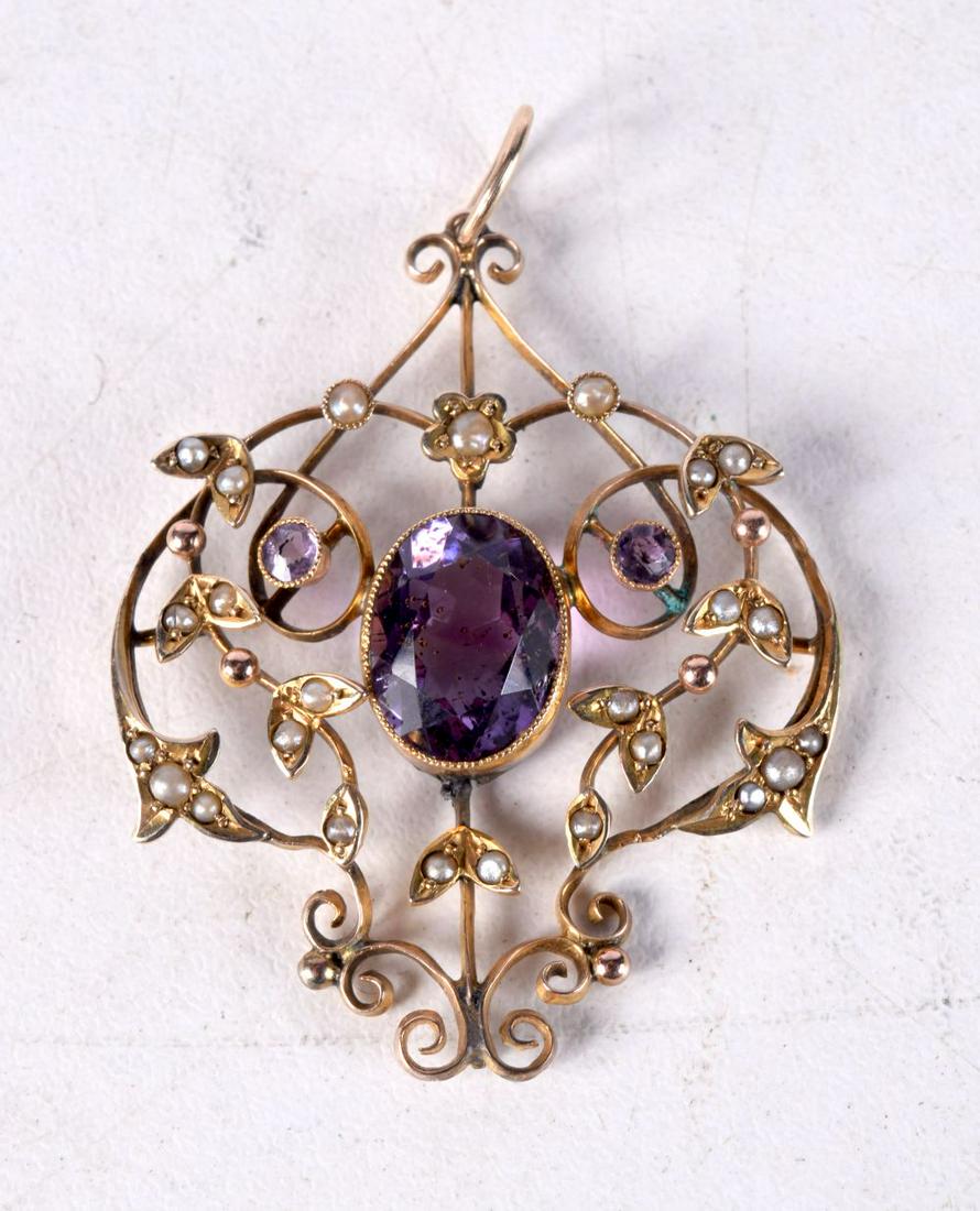 A 9CT GOLD AND AMETHYST PENDANT WITH SEED PEARLS.  4.5cm x 3.2cm, weight 4.3g (1 of 3)