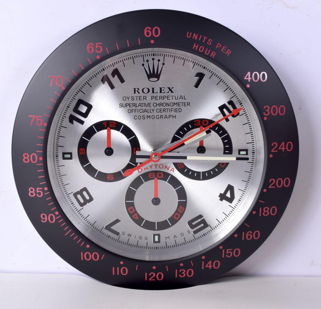 A ROLEX SHOP DISPLAY ADVERTISING WALL CLOCK. 33 cm diameter.: A ROLEX SHOP DISPLAY ADVERTISING WALL CLOCK. 33 cm diameter.
