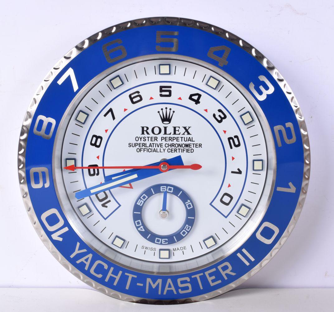 A ROLEX SHOP DISPLAY ADVERTISING WALL CLOCK. 33 cm diameter. (1249C