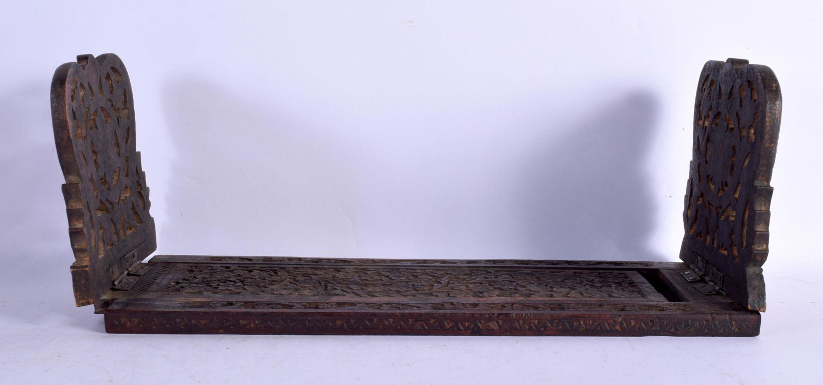 A MIDDLE EASTERN ISLAMIC CARVED WOOD SLIDING BOOK RACK. 60 cm x 15 cm extended. (1 of 4)