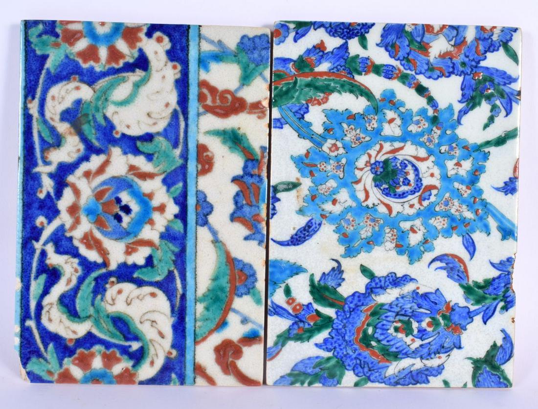 A PAIR OF TURKISH OTTOMAN MIDDLE EASTERN POTTERY TILES. 22 cm x 18 cm. (1 of 4)