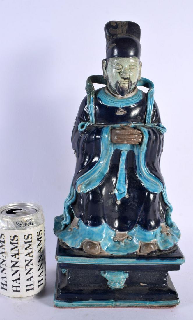 A RARE LARGE 16TH/17TH CENTURY CHINESE FAHUA POTTERY FIGURE OF AN IMMORTAL Ming/Qing, modelled with (1 of 6)