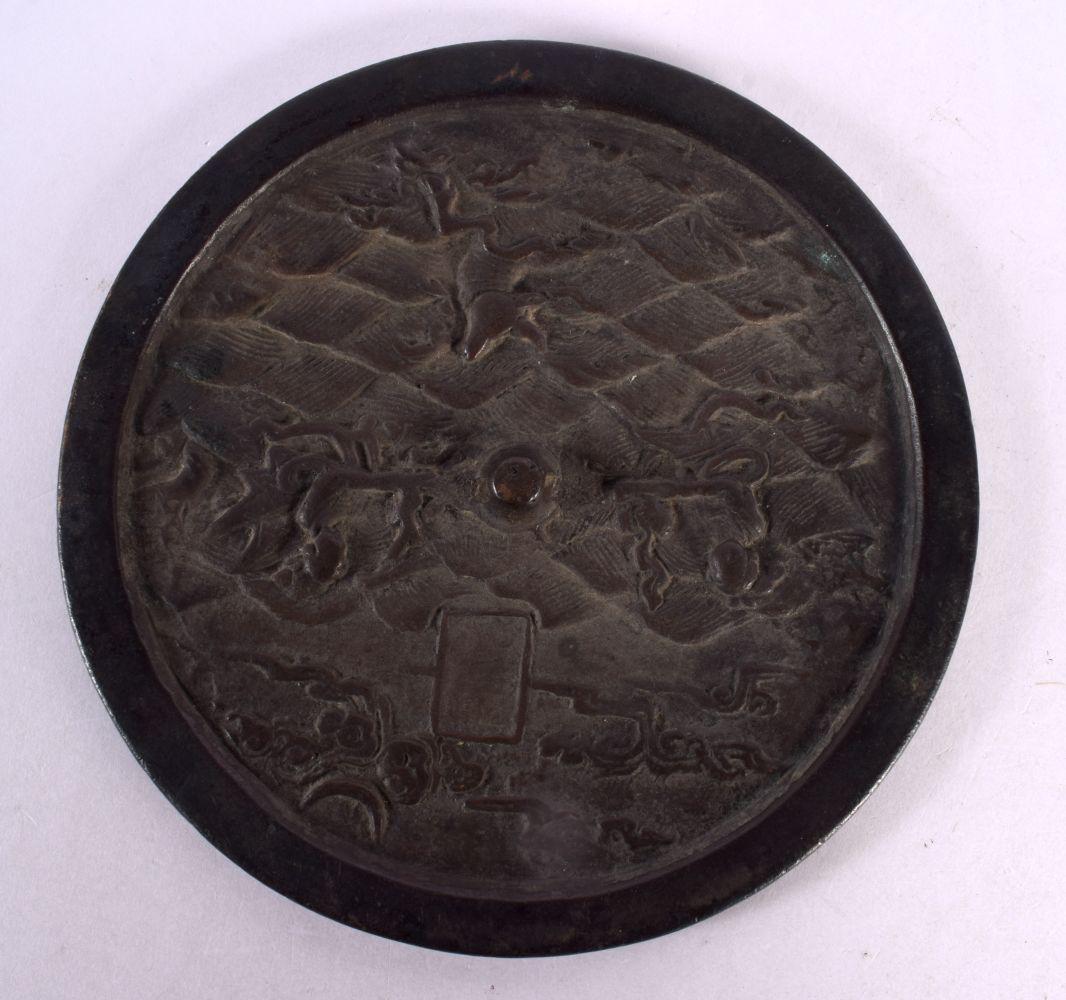 A 16TH/17TH CENTURY CHINESE BRONZE MIRROR Ming/Qing, decorated with figures. 18.5 cm diameter. (1 of 2)