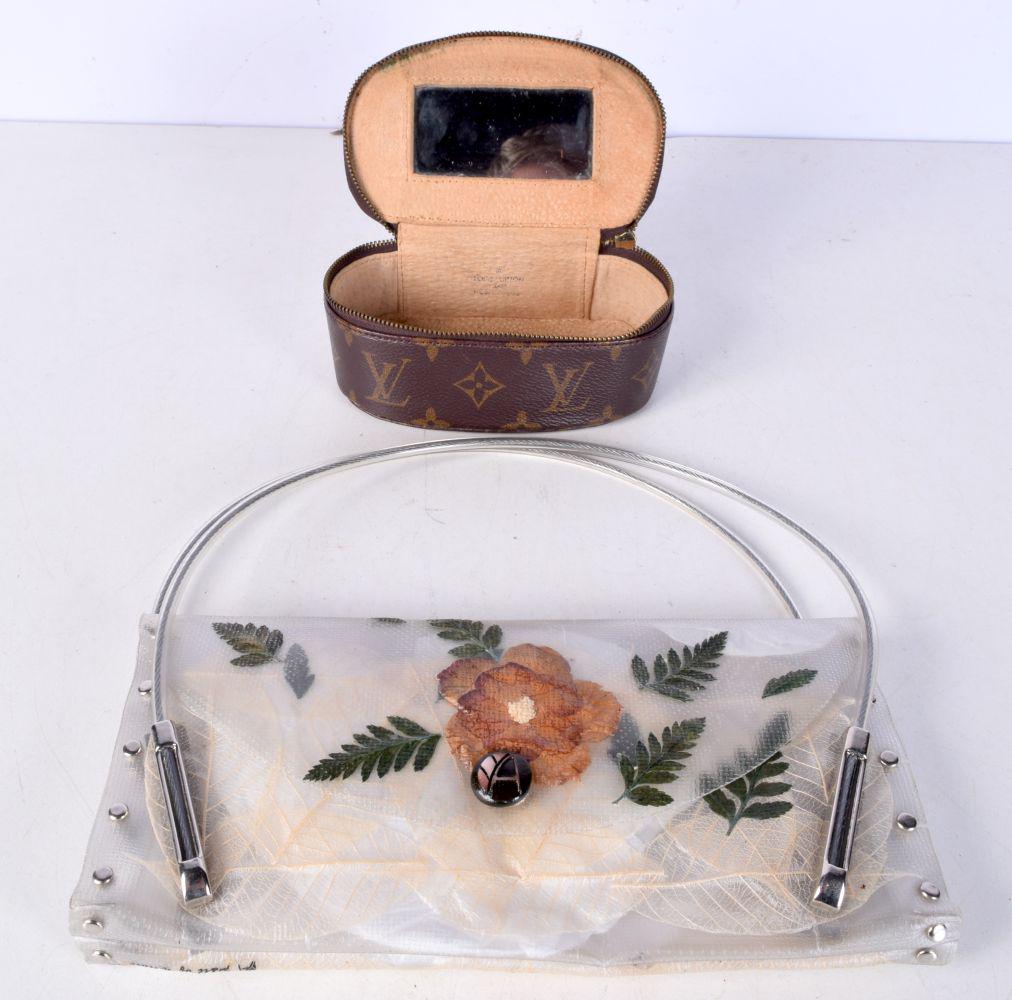 A small Louis Vuitton make up bag together with a "Part of nature" handbag 25 x 12 cm (2). (1 of 4)
