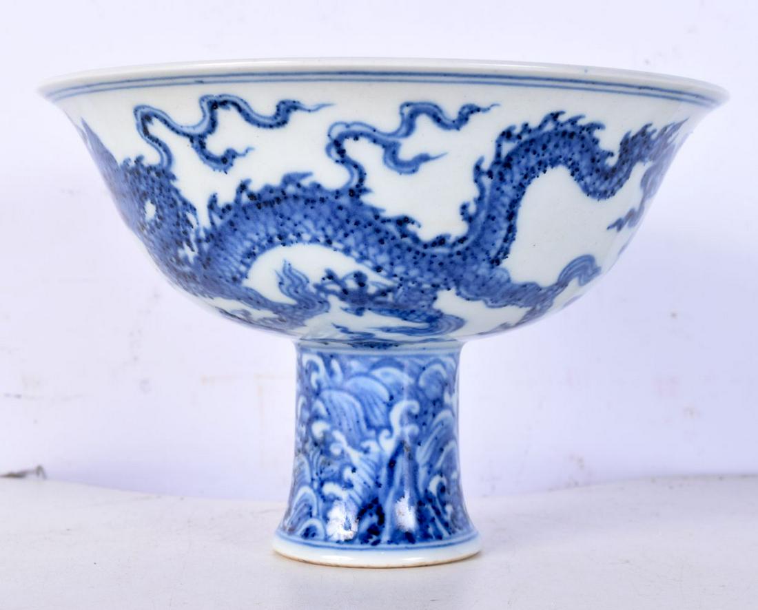 A Chinese porcelain blue and white Dragon stem cup 10 x 15 cm. (1 of 6)