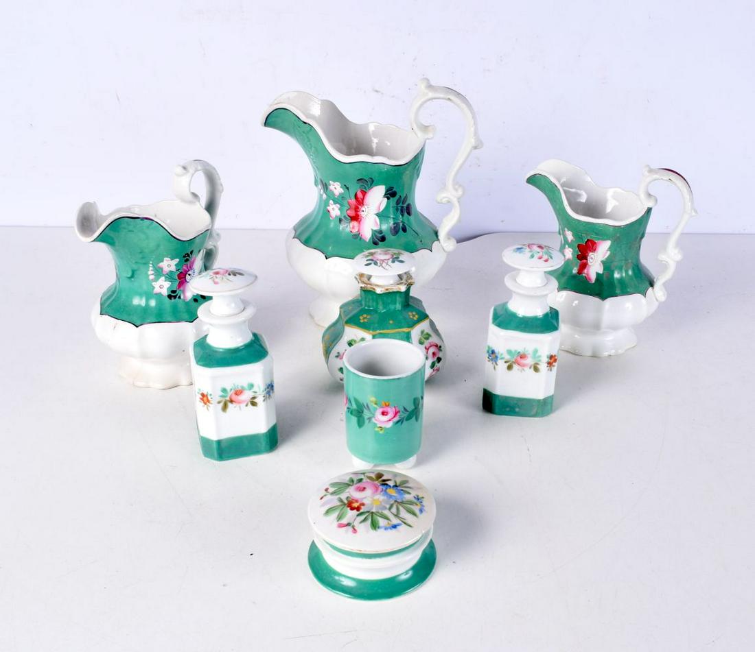 A collection of Paris porcelain including jugs, scent bottles, cosmetic pots, etc. (8). (1 of 3)