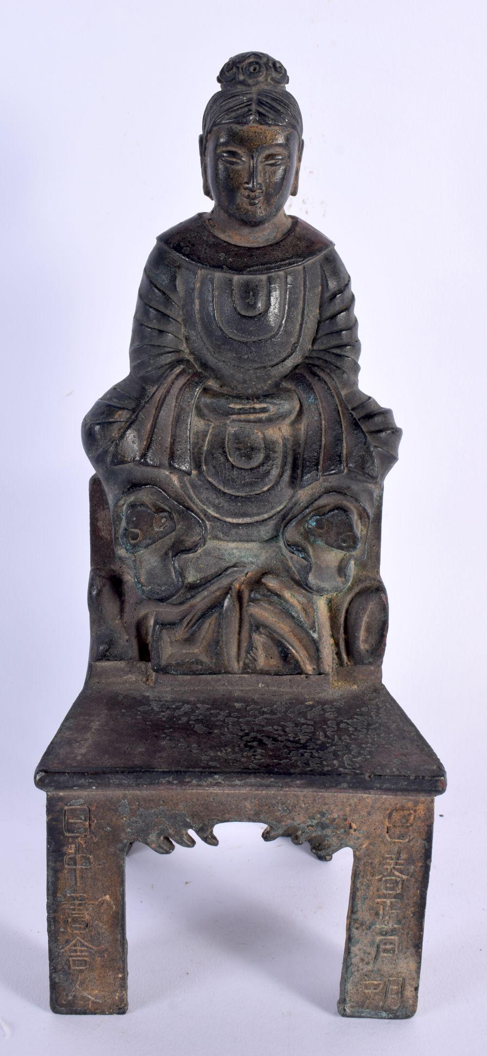 AN UNUSUAL CHINESE QING DYNASTY POLYCHROMED BRONZE BUDDHA Wei Dynasty style, surrenly modelled with (1 of 7)