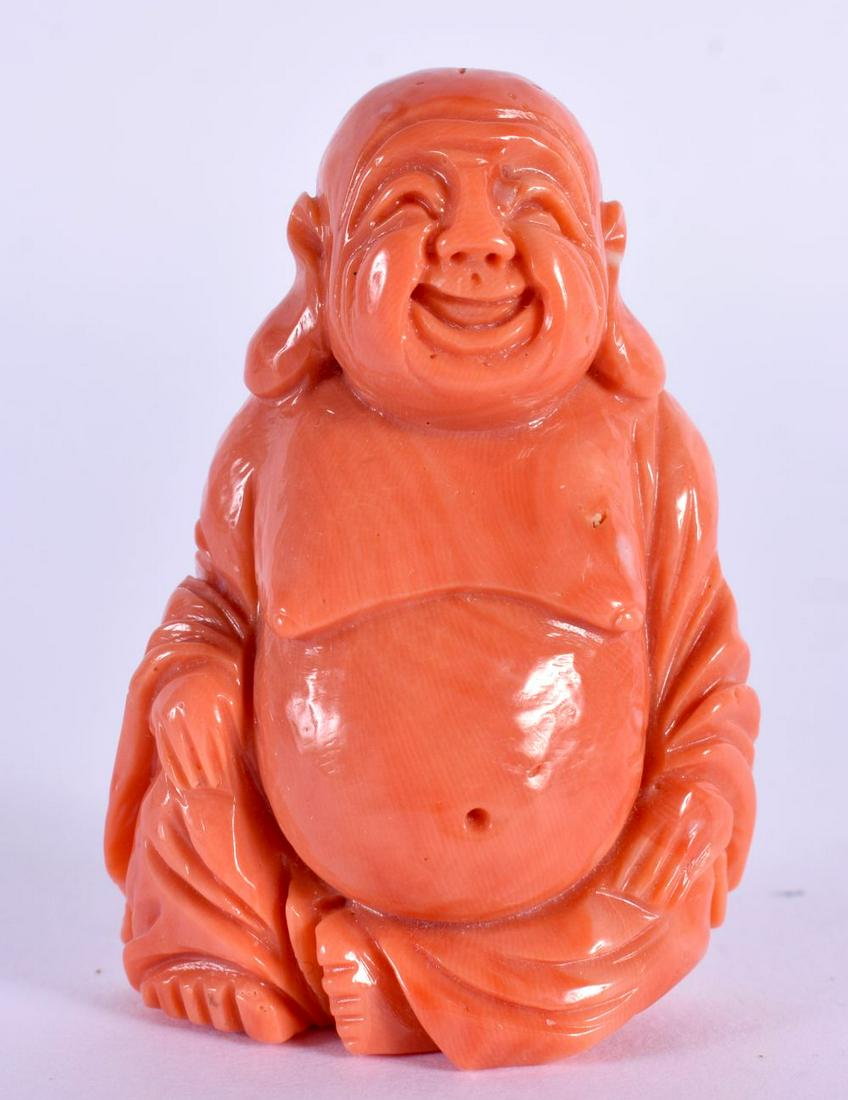 A SMALL 19TH CENTURY CHINESE CARVED RED CORAL FIGURE OF A BUDDHA Qing. 42 grams. 5 cm x 3.5 cm. (1 of 4)