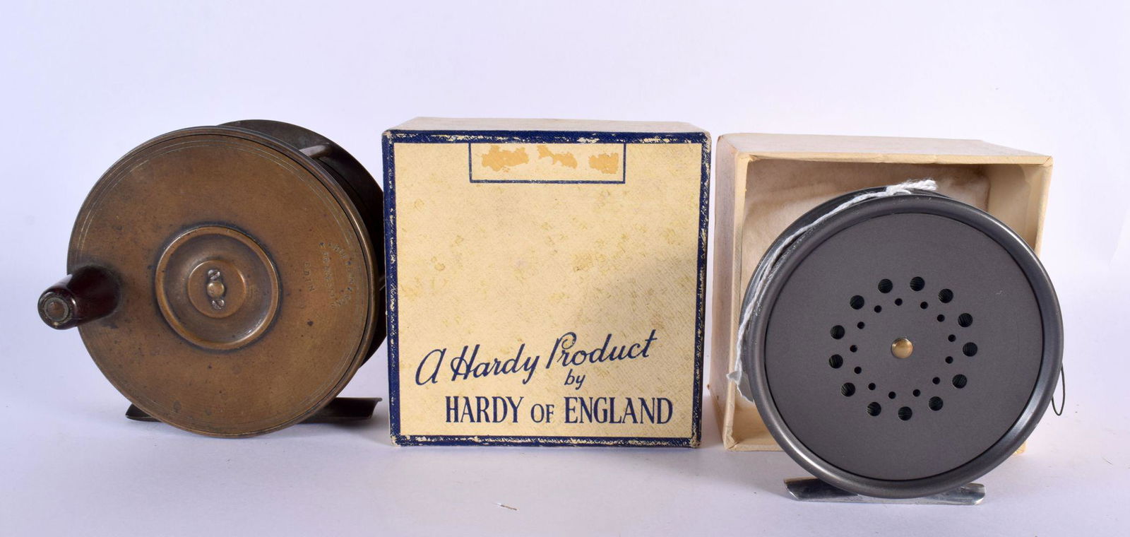 TWO FISHING REELS. Largest 12.5 cm wide. (2) (1 of 8)