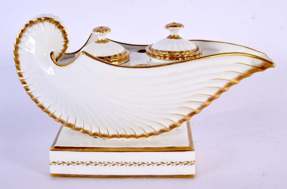 A LOVELY EARLY 19TH CENTURY EUROPEAN PORCELAIN INKWELL modelled as a shell with removable liners. 19: A LOVELY EARLY 19TH CENTURY EUROPEAN PORCELAIN INKWELL modelled as a shell with removable liners. 19 cm x 13 cm.