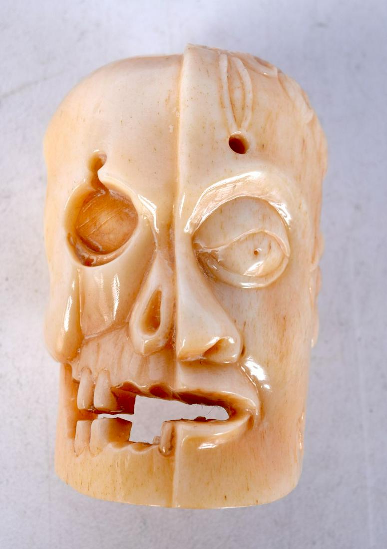 A JAPANESE BONE SKULL NETSUKE. 3.5 cm x 3.5 cm.: A JAPANESE BONE SKULL NETSUKE. 3.5 cm x 3.5 cm.